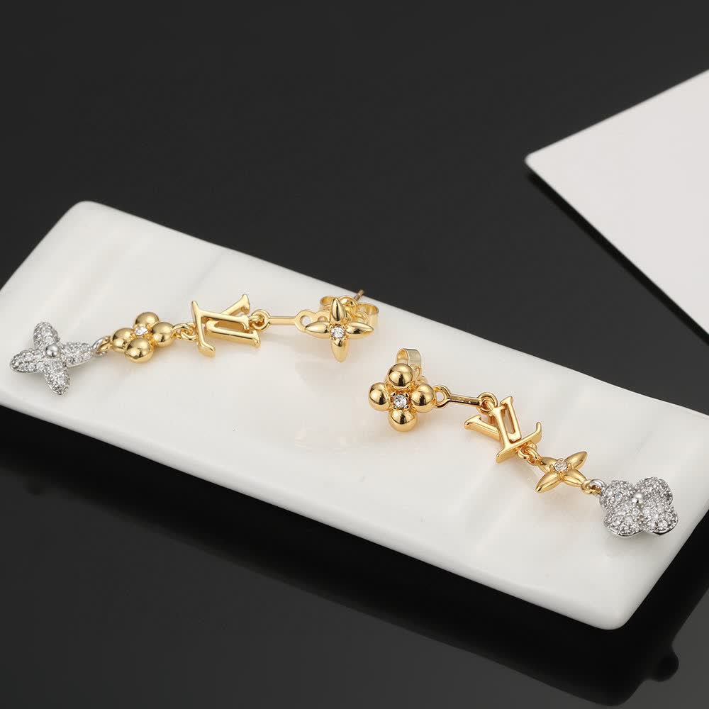 Louis Vuitton Gold Tone Earrings with Monogram and Crystal Flower